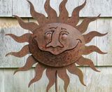 Rusty sun sculpture.