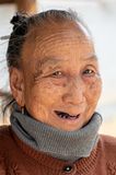 Kham, Tai Lu Woman, 73, Weaver