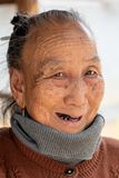 Kham, Tai Lu Woman, 73, Weaver