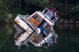 Capsize in Pristine Waters<br><h4>*Credit*</h4>