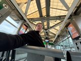 In the Newark Airport train station heading toward Fordham to see Simon. 