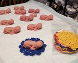 3 inch sleeping silicone babies and one 2 inch