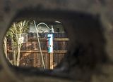 Bird feeders through a peephole