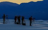 Photographers shoot the sunset in White Sands National Park in New Mexico