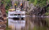 View of the Taylors Falls Princess rounding Angle Rock on the St. Croix River in St. Croix NSR