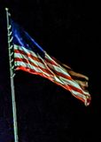Nighttime flag image at the Hilltop RV Park in Ft. Stockton, Texas