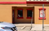 Walter White waits at Los Pollos Hermanos in Breaking Bad