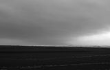 Kapiti Island from Ōtaki Beach on a bleak day