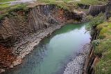 02-3B9A0849-The Beautiful Jokla River rushing through Studlagil Canyon in Iceland.jpg