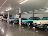 Luckys Garage. Left to right, 1956 Ford, 1959 Cadillac, 1957 Chevrolet, late 1950s Pontiac, 1950s Packard?, 1956 Mercury (5330)
