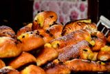On the street - Honey bees on honey coated pastries Moroc-3541