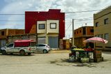 04 02 04 02 Produce vender in a small town along the way Moroc-4062