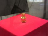 Tiny gold vessel