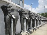 Guarded by a wall with a frieze of...
