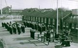 UNDATED - JOHN PHILLIPS, SEA CADETS ON THE QUARTER DECK FOR COLOURS OR SUNSET.jpg