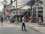 Manila street scene (and This trip is cursed)