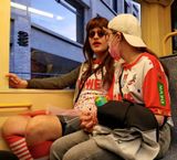 Koln: carnival people; the guy is disguised on girl and ... vive-versa.