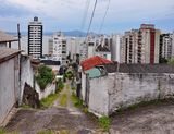 View of Rua Augusto Fausto de Souza, from the white house towards the sea and my building. 