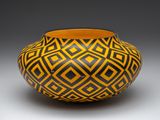 Made from Yellow Cedar. 7.5 h x 14 dia. and decorated.