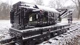 Wrecker in yard March 16, 2025