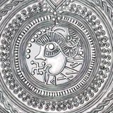 Geltorf (Schleswig-Holstein, German) bracteate head design (IK 255) showing stylistic parallels with the Brinton bracteate head 