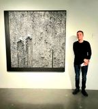 Ryan McCoy with one of his works.