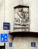 Le Remouleur bas-relief in the Marais, originally a sign for a wine/spirit merchant named Au Gagn-Petit