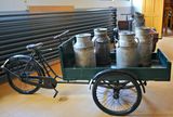 Cargo bike with milk cans