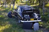 Our Cuban driver fixes the 1951 Chevy