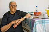 Woman serving her guest coffee and walnuts
