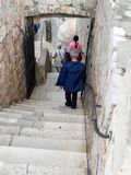 Descending some steps on the wall of the Old Town
