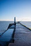 Anglers on the breakwater