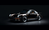 studiogh_this_porsche_911_is_parked_behind_shiny_black_glass__f03cfe46-6e31-401d-a191-db78216fe587_3.png