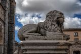 Lion Sculpture In Front of  Avila Cathedral