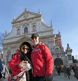 Enjoying a pretzel in front of the Church of Saints Peter and Paul in Krakow, Poland