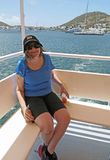 Susan on back of top deck of our tour boat