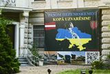 Banner in front of Ukranian Embassy says, We will win together