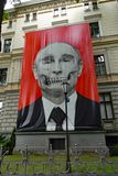Banner on the Museum of Medical History faces the Russian Embassy in Riga, Latvia
