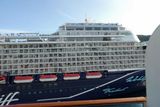 Passing close to a German cruise ship in Alesund, Norway