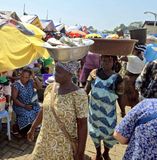 Women darrying fiah at the Sekondi Fish Market in Ghana.jpg
