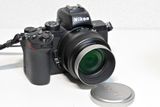the lens with Contax-G hood for G-Planar 35mm