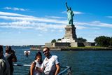 With Lady Liberty, New York, USA