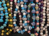 Paper, wood and  fabric beads