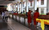 MONKS FEEDING THE ELDERLY AND DISABLED