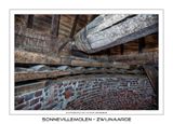 014 Het kruiwerk met houten rollen