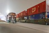 Westbound Freight Cars Passing Eastbound Train 90D52795