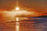 Sun Rising Beyond Steam Fog 90D58069-73