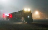 Eastbound Freight Train In Night Fog 90D59939