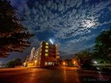 Clouded Moon At Night Beyond The Hotel (iPhone14-1562)