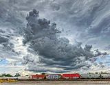 Unsettled Sky Over The Rail Yard (iPhone14-2235)